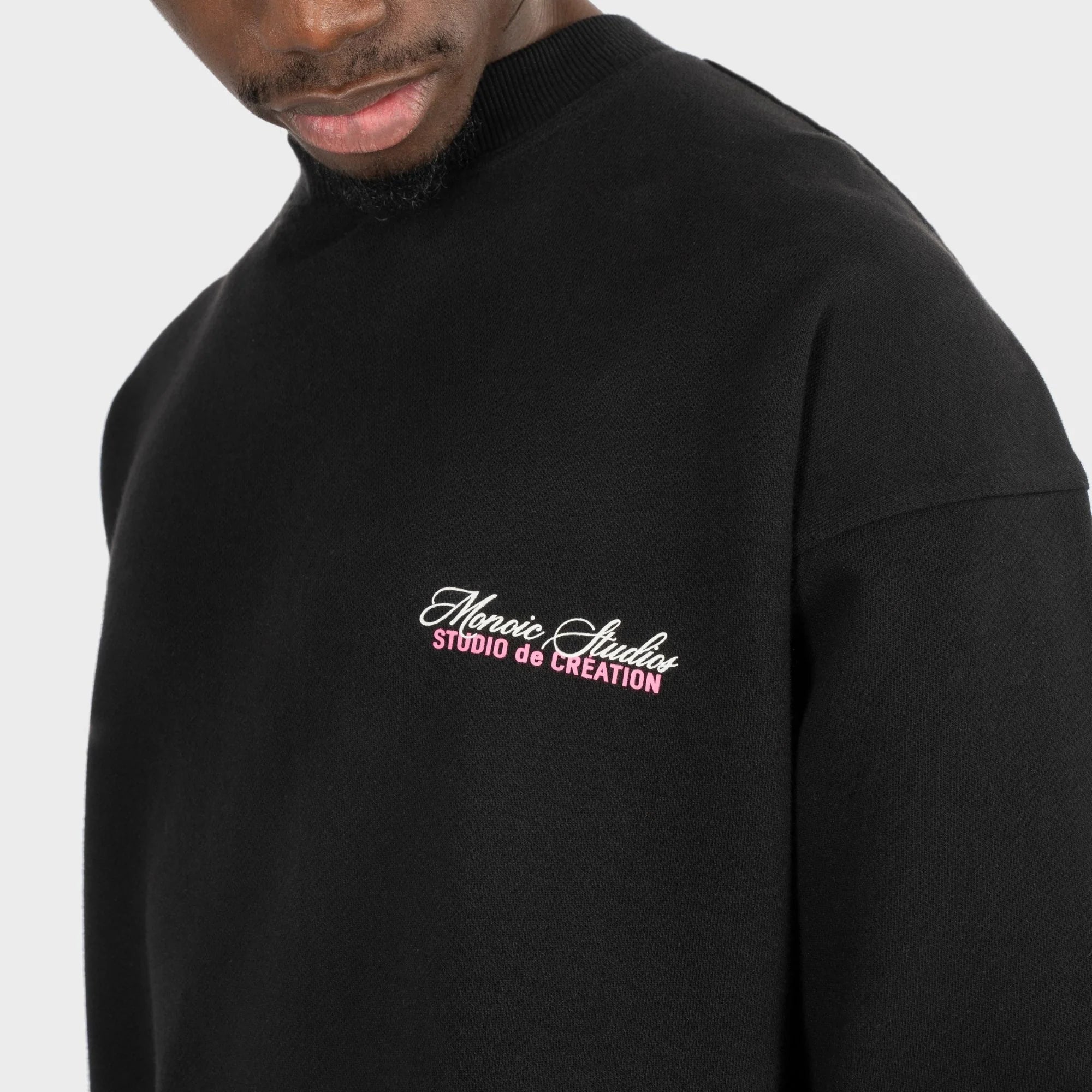 BUZO MONOIC STUDIO DE CRÉATION NEGRO Y ROSADO